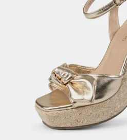 Online SANDALIA CUÑA YUTE MOÑO ORO Mujer Sandalias Y Plataformas